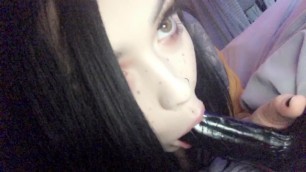 Sucking on my Big Black Dildo
